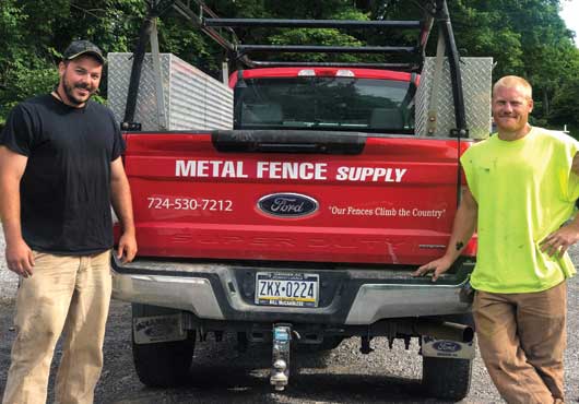Metal Fence Supply Co. Owner Brandon Dando (left) and employee Brett Kirkwood get ready to head to a job site.